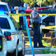 Police in Ladson, S.C., stand outside the home where they say a 13-year-old boy fatally shot an armed robber Nov. 10, 2015.
WCSC-TV